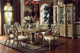 The table has a shiny metal frame that is topped off with an appealing textured wood top. Pin Di Esszimmer Dekoration
