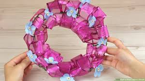 The small pro bow the hand was designed for #9 ribbon. 3 Ways To Make A Ribbon Wreath Wikihow