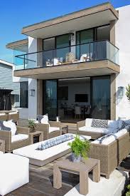 Covered terrasse with folding patio doors. Second Floor Balcony Design Ideas