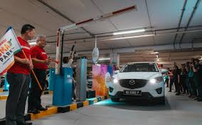 A parking lot (american english) or car park (british english), also known as a car lot, is a cleared area that is intended for parking vehicles. Sunway S Parking Lot Makes A Great Leap Towards Sustainability Wapcar