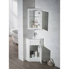 They usually have a small cabinet or storage beneath where plumbing can be accessed. Stufurhome Hampton White 27 Inch Corner Bathroom Vanity With Medicine Stufurhome