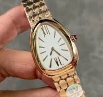 Famous Brand Roman Numerals Waterproof Quartz Ladies Watch with Geometric  Mesh Band Red Stone Mesh Watches