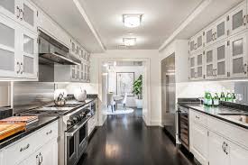 To go contemporary, pair your white cabinets with black hardware. Design Recipes A Case For White Kitchen Cabinets