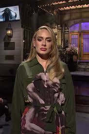 Adele waves a rally towel during the second half in game five of the nba finals between the milwaukee bucks and the phoenix suns at footprint center on july 17, 2021 in phoenix, arizona. The Best Dressed Celebrities Of The Week From Adele On Snl To Blackpink S Rose On Good Morning America In 2021 Adele Adele Snl Celebrities