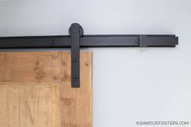 It also creates space for the new sliding door away from the wall to clear the trim. Installing Barn Door Hardware In 5 Easy Steps Sawdust Sisters