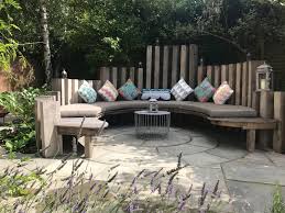 This Is A Nice Look With The Staggered Back Back Posts Are Wide Enough To Use As Drink Holders Mini T Built In Garden Seating Outdoor Seating Garden Seating