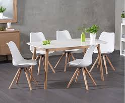 With Its Clean And Understated Look The Nordic 150cm Oak And White Dining Table With Oscar Faux Leather Round Leg Chairs Is Ideal For Updating Your Interior Wi White Dining Table
