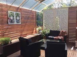 16 Incredible Patio Divider Walls For Your Home Breakpr Outdoor Rooms Patio Patio Design