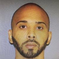 Suspect in officer shooting in custody