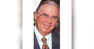 John E. Chesher Obituary