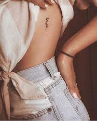 Small tattoos are not a girl's thing anymore. Image About Beauty In Tattoos By â„³orningstar Rose Rib Tattoos Rib Tattoo Tattoos