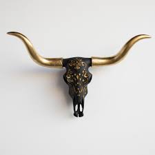 They make great conversation pieces as well. Faux Large Black Carved Texas Longhorn Skull With Gold Details Wall Decor Southwestern Wall Sculptures By Near And Deer Houzz