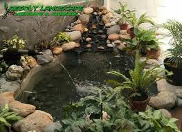 Jasa Pembuatan Kolam Ikan Koi Minimalis Di Surabaya Backyard Water Feature Water Features Plants