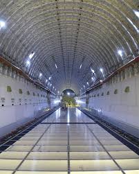 One of the boeing company's dreamlifter cargo aircraft sits on the tarmac at their factory in everett, washington, with the tail of the. Boeing 747 Large Cargo Freighter Lcf Dreamlifter From Inside The Cargo Compartment The Cargo Hold Has A Volum Boeing Dreamlifter Air Cargo Boeing Aircraft