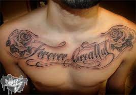 Roses And Writing On Chest Tattoo Pictures At Checkoutmyink Com Writing Tattoos Chest Tattoos For Women Cool Chest Tattoos