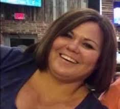 Rayna Moore, a respiratory therapist, died last year of COVID at the young  age of 42 after volunteering to help patients at a nursing home in addition  to her full-time hospital job.