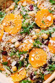 This Colorful And Delicious Quinoa Salad Features Juicy Clementines Sweet Cranberries Protein Rich Chickpeas Fr Quinoa Salad Vegan Salad Greek Quinoa Salad