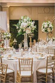 White Gold Green Wedding Ideas Elegant Wedding Inspiration Tall Wedding Ce Wedding Decor Elegant Elegant Wedding Centerpiece Flower Centerpieces Wedding