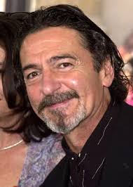 Don Novello as Father Guido Sarducci