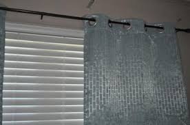 Sun zero troy home theater grade extreme blackout grommet curtain panel provides the ultimate in light blocking technology to keep out even the harshest of light while bringing an elegant sophistication to any room of your home. Sun Zero 2 Pack Stockton Tile Jacquard Blackout Grommet Curtain Panel Pair Walmart Com Walmart Com