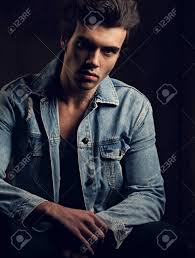 Handsome Male Model Posing In Fashion Blue Jeans Jacket Looking Stock Photo Picture And Royalty Free Image Image 90928402 You don't want your feet so far from the wall that you are at a significant angle. handsome male model posing in fashion blue jeans jacket looking