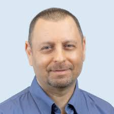 In the field of game theory, can anyone refer me to papers dealing with  multi-objective transportation games ?