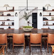 A Creative Power Couple S Spanish Colonial Retreat In L A Long Dining Table Dining Room Design Rustic Dining Room