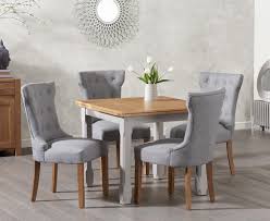You may also see this table design in a several well know high street stores for significantly more! The Somerset 90cm Flip Top Oak And Grey Dining Table With Camille Grey Fabric Chairs Extends To Seat 8 With An Oak Edged Top With Veneer Inserts The Somerset Is Finished In Clear