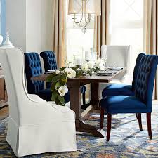Crafted With A Birch Frame Foam Padding And Dressed In A Removable Cotton Slipcover Our Aislin D Dining Room Blue High Back Dining Chairs Brown Dining Table