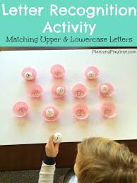 Write pairs of letters on sticker dots and place them on the bottom of several hershey's kisses. Preschool Letter Recognition Activities Planning Playtime
