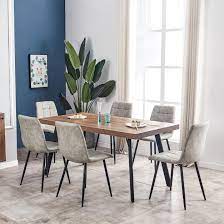 In smaller spaces, consider a round walnut dining table for four or six instead. Florence Walnut Dining Table Lawlors Furniture Flooring