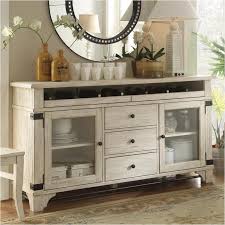 It's also used as an extra surface for serving food. 27356 Riverside Furniture Regan Dining Room Sideboard