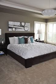 This Is Somewhat The Look I Hope To Achieve In Our New Master Dark Furniture White Comforter Neutral Walls Brown Furniture Bedroom Home Bedroom Wall Colors