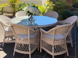 seaside hamptons style 7 piece round outdoor dining setting synthetic wicker with grey cushio outdoor dining set outdoor furniture sets outdoor dining chairs