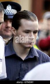 Luke Mitchell quittant la haute cour, après avoir été reconnu coupable du  meurtre de sa petite amie Jodi Jones Photo Stock