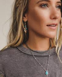 These dreamy danglers are the kind of accessory that tells a story. With  celestial charm and a touch of turquoise, the Moon Drifters Earrings are  here to elevate your everyday magic.⁠ ⁠