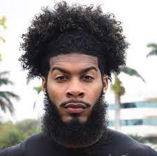 Pin By Tim Johnson On Kareem Katia Natural Hair Men Curly Hair Men Man Ponytail