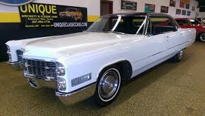 Image result for Starlight Silver 1966 Cadillac
