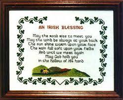 Model stitched over one thread on 40 ct silk gauze, provided in chartpack using gentle arts sampler threads and weeks dye works (dmc alternates are 167, 829, (2) 3866, 520, 522, 642, 500, 895). The Irish Collection An Irish Blessing Celtic Cross Stitch
