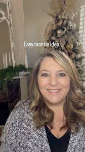 Here is a simple and easy mantle. Start with an inexpensive garland and  then layer a Norfolk pine branch
