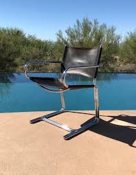 Featuring a beautiful tufted squared back, simple lines and tapered legs, this mid century accent chair delivers exquisite visual performance to your guest and serves as a ideal addition to your home. Mid Century Modern Leather Sling Chair Encore Modern