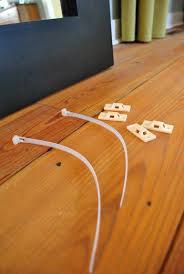 Mirror Mirror Strapped To The Wall Babycenter Furniture Wall Straps Toddler Proofing Baby Proofing