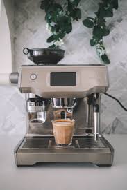 Smart coffee makers streamline your morning routine, so you can start brewing a fresh cup from your smart device without getting out of bed! Breville Oracle Touch Tutorial Kelly In The City Lifestyle Blog