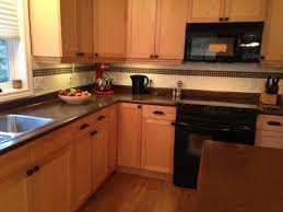 Although the process below is for my garage cabinets, you can follow the same technique to paint veneer kitchen cabinets as well! Our Painted Maple Cabinets 2 Years Later Kylie M Interiors