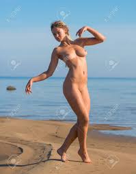 Beautiful Naked Woman Posing At The Beach Stock Photo, Picture And Royalty  Free Image. Image 30520907.