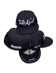 Talib Kweli Bkmc New Era Cap The Official Talib Kweli New Era 59 Fifty Fitted Hat Is All Yankee Navy Blue Including Th Fitted Hats Blacksmith Logo Duck Down