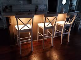 You Can Use Under Cabinet Lighting Under Your Kitchen Island Or Peninsula To Create A Warm And I Under Cabinet Lighting Cabinet Lighting Breakfast Bar Lighting