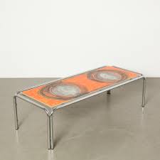 You can choose from available finishes to customize the surfboard look. Oange Tiles 1970s Coffee Table Neef Louis Design Amsterdam
