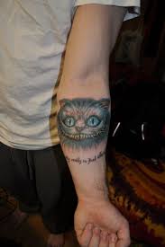 If your canvas does gather any dust you may wipe it off gently with a clean, damp cloth. My First Tattoo The Cheshire Cat Quote Reads I M Not Crazy My Reality Is Just Different Than Yours Done By Gino Angelov At Diamond Jacks London Tattoos