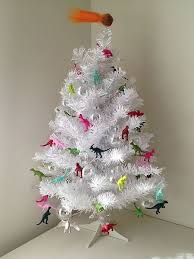 Hilarious Ways To Upcycle Plastic Dinosaurs Brisbane Kids White Christmas Tree Decorations Dinosaur Christmas Tree Dinosaur Christmas